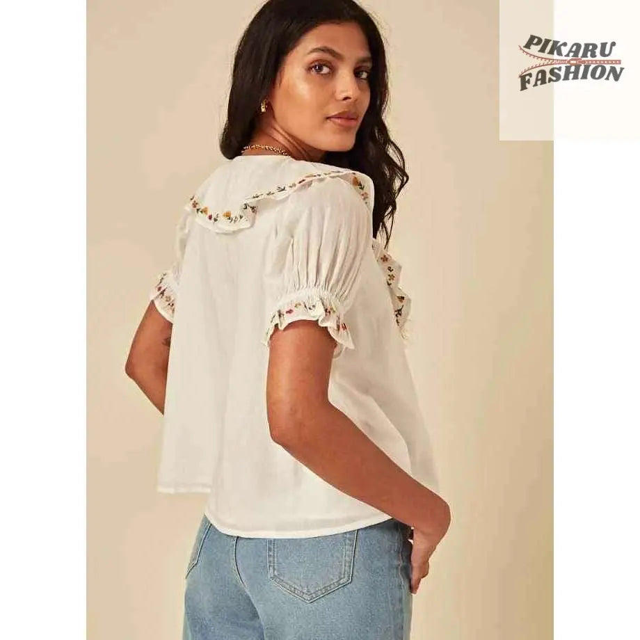Embroidered Puff Sleeve Top – back view with floral sleeve details