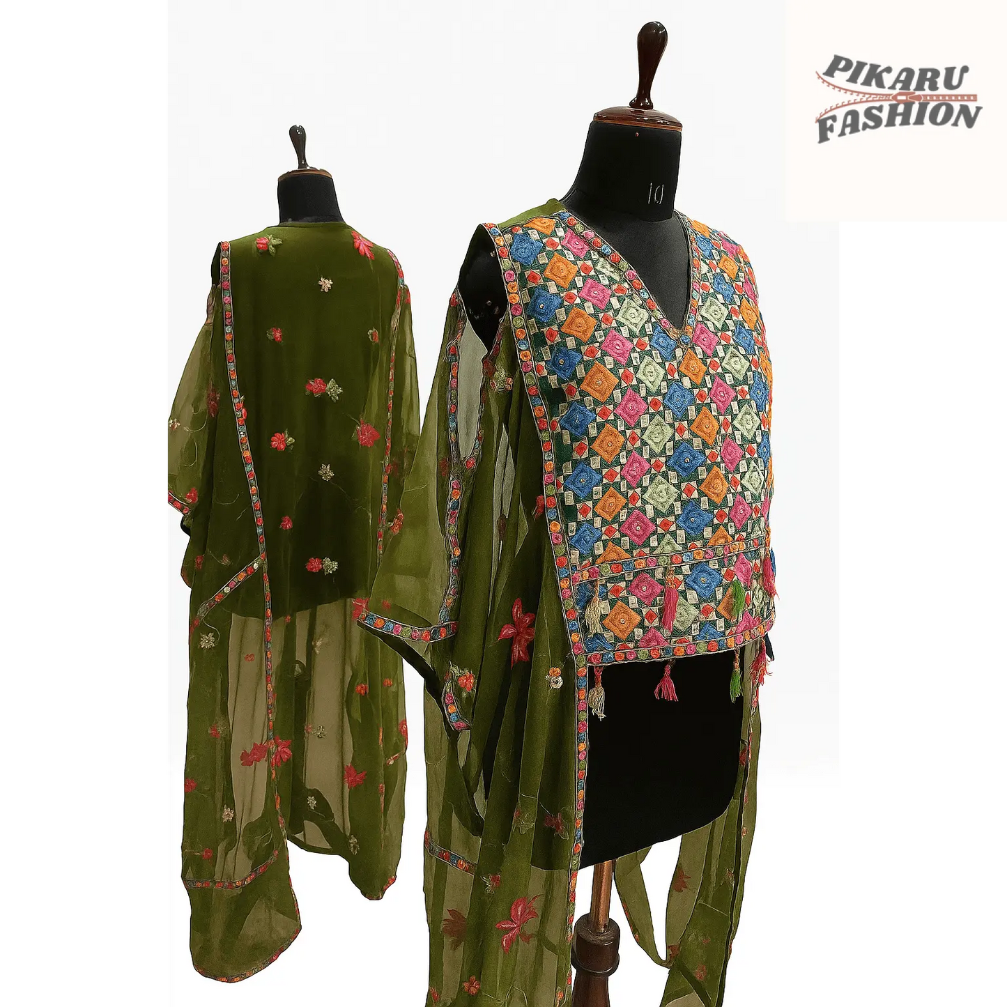 Chiffon embroidery jumpsuit with fringe displayed on a mannequin, featuring colorful floral patterns and sheer overlay.