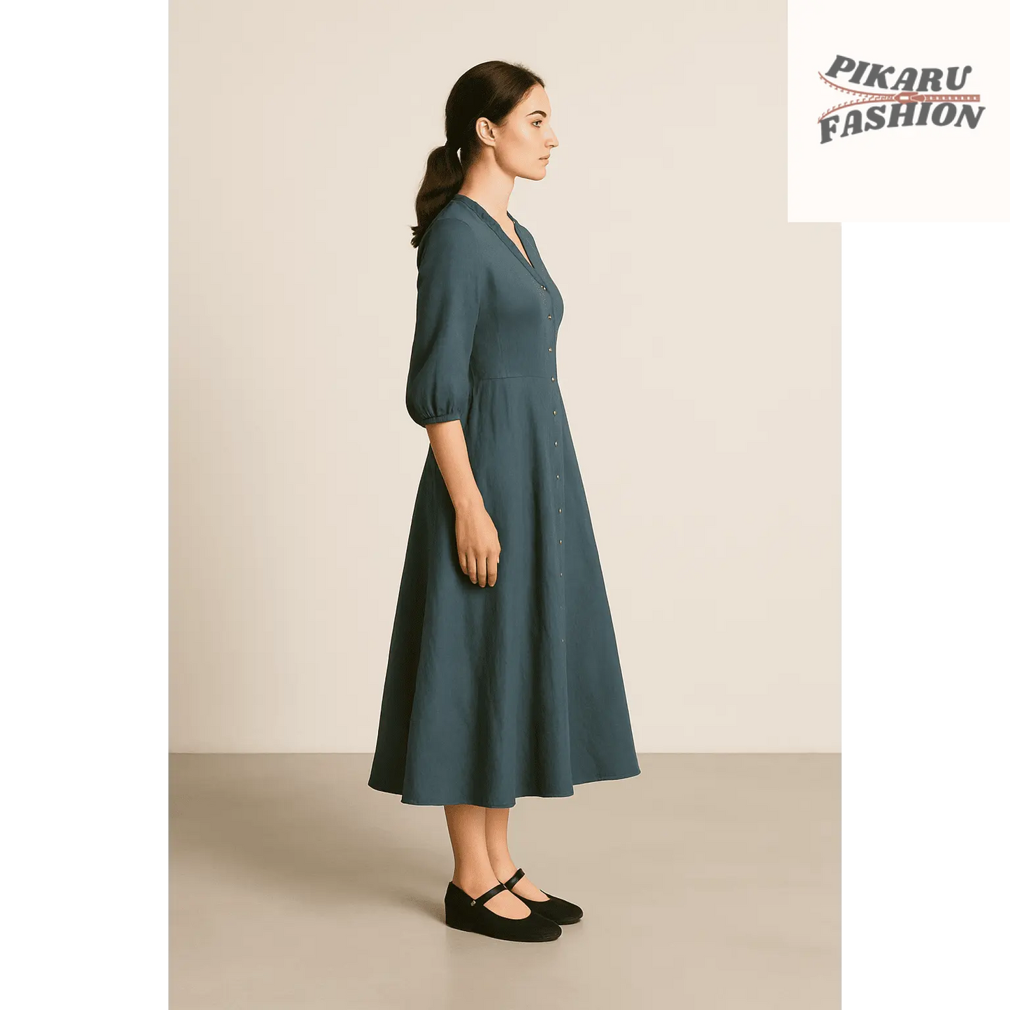 Teal Button Down Midi Dress showcased on a model from the side, highlighting its elegant fit-and-flare silhouette.