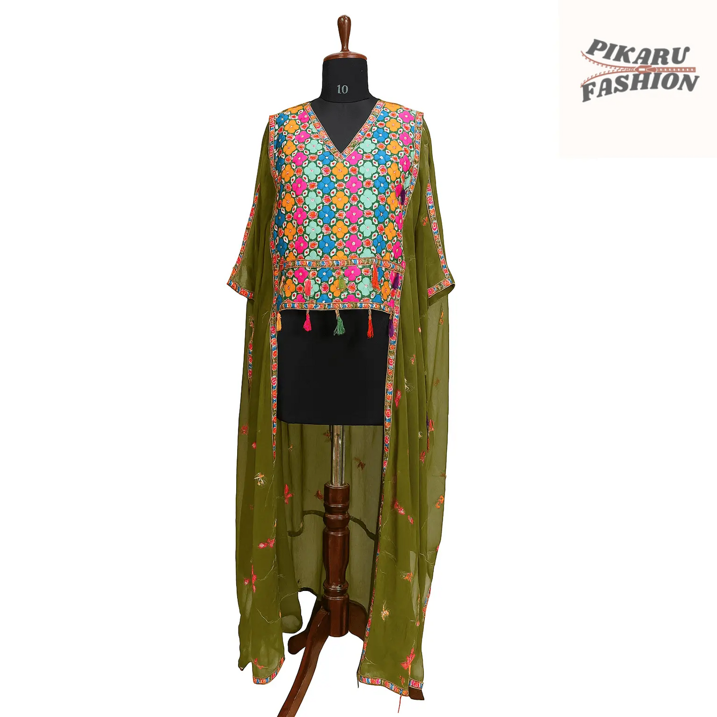 Chiffon embroidery jumpsuit with fringe displayed on a dress form, featuring colorful embroidery and tassels.